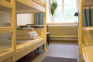 Хостелы Hostel Suomenlinna Хельсинки Односпальная кровать в общем номере для мужчин и женщин-2